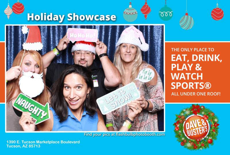 Friends posing in holiday GIF booth rental